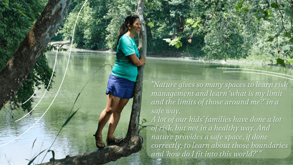 Julie stands on a tree limb over the White river.